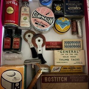 Vintage desk items, monopoly pieces, glasses and rubber stamps